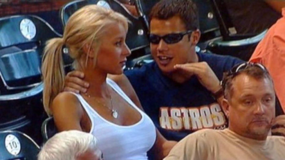 Hot girl with awkward controlling guy's hands on her neck
