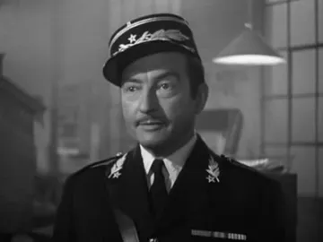 Captain Renault is shocked to find Claude Rains gambling in Casa