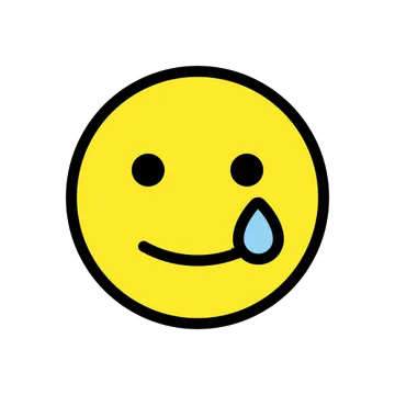 Smiling face with tear