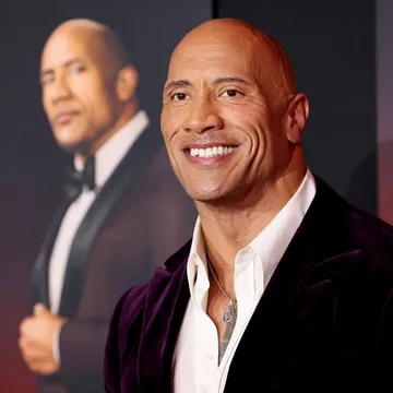 The Rock with The Rock in the background