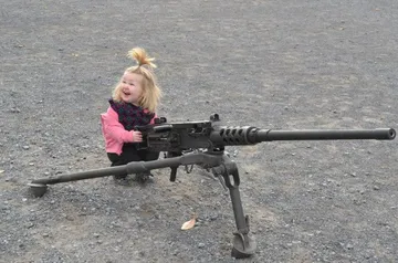 Baby girl machine gun