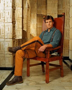 Firefly Captain Mal Reynolds on a Chair