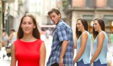 Distracted boyfriend with two girlfriends