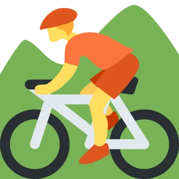 Person mountain biking